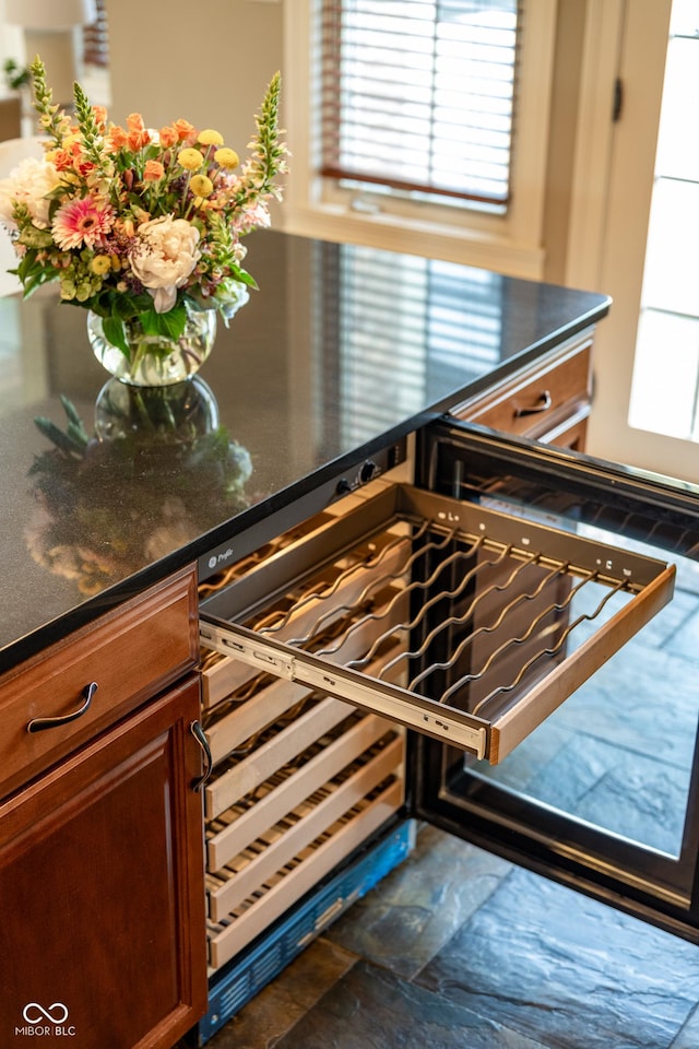 4890 Benthaven Dr E, Bargersville, IN 46106 - detailed view of dark countertops and brown cabinets