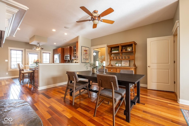 4890 Benthaven Dr E, Bargersville, IN 46106 - dining room with light wood-type flooring, baseboards, ceiling fan, recessed lighting, and a chandelier