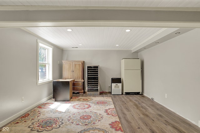 unfurnished office with beverage cooler, wooden ceiling, ornamental molding, recessed lighting, and light wood-type flooring