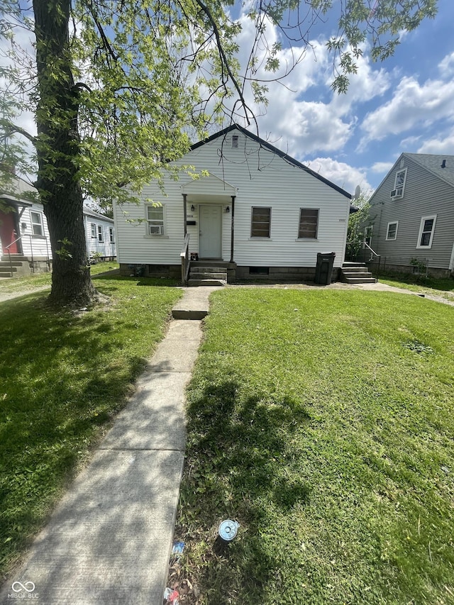 2037 Glenridge Dr, Indianapolis, IN 46218 - bungalow with a front lawn