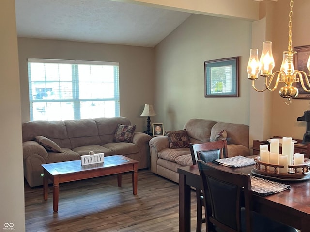 14058 Southwood Cir, Fishers, IN 46037 - living area featuring healthy amount of natural light, wood finished floors, a chandelier, and vaulted ceiling
