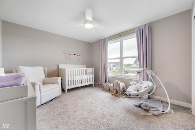 16270 Northwind Ct, Westfield, IN 46074 - bedroom featuring a crib, carpet floors, ceiling fan, and baseboards