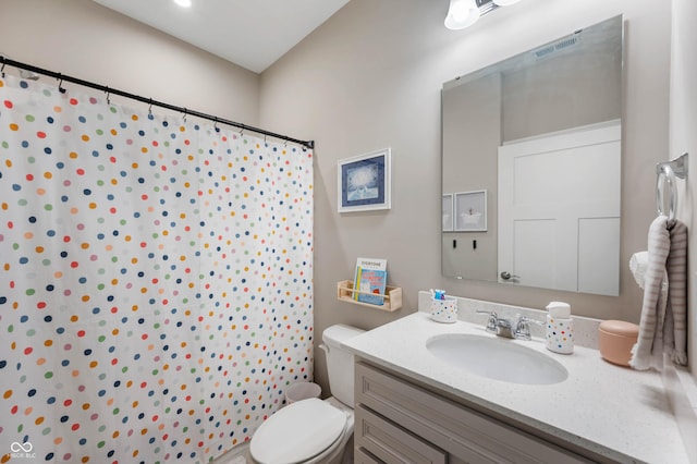 16270 Northwind Ct, Westfield, IN 46074 - bathroom with toilet, vanity, and a shower with shower curtain