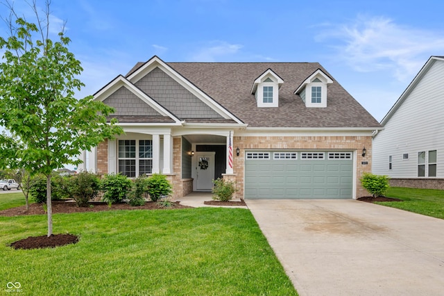 16270 Northwind Ct, Westfield, IN 46074 - craftsman-style house with brick siding, a front yard, driveway, and roof with shingles