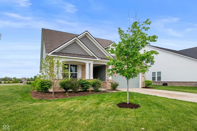 16270 Northwind Ct, Westfield, IN 46074 - view of front of home featuring driveway, a front yard, roof with shingles, brick siding, and a garage