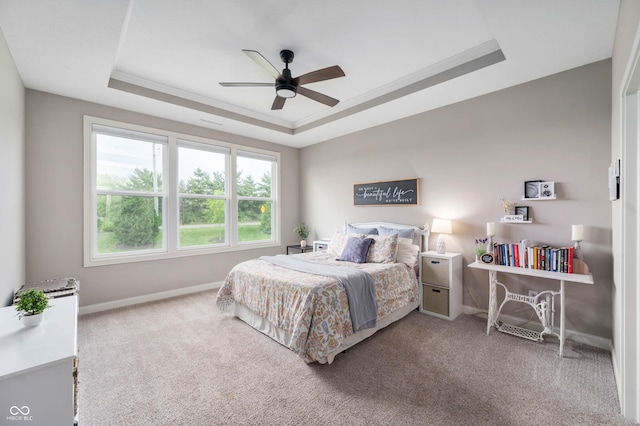 16270 Northwind Ct, Westfield, IN 46074 - bedroom with a tray ceiling, carpet flooring, baseboards, crown molding, and a ceiling fan