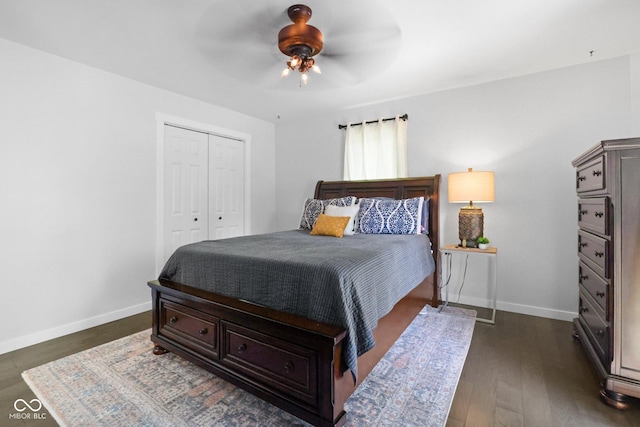 6673 Karyn Dr, Avon, IN 46123 - bedroom featuring a closet, dark wood-style flooring, baseboards, and ceiling fan