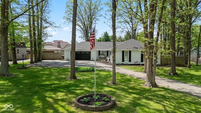 6673 Karyn Dr, Avon, IN 46123 - single story home featuring asphalt driveway and a garage