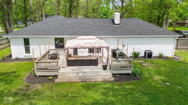 6673 Karyn Dr, Avon, IN 46123 - rear view of house featuring an outdoor hangout area, roof with shingles, and a wooden deck