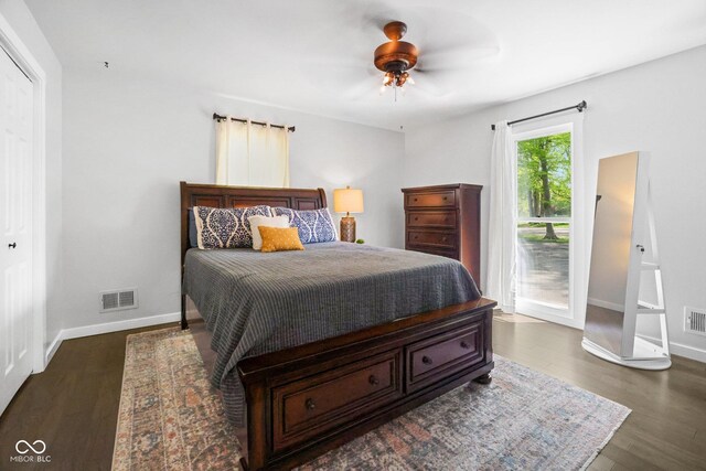 6673 Karyn Dr, Avon, IN 46123 - bedroom featuring baseboards, dark wood-style flooring, and ceiling fan