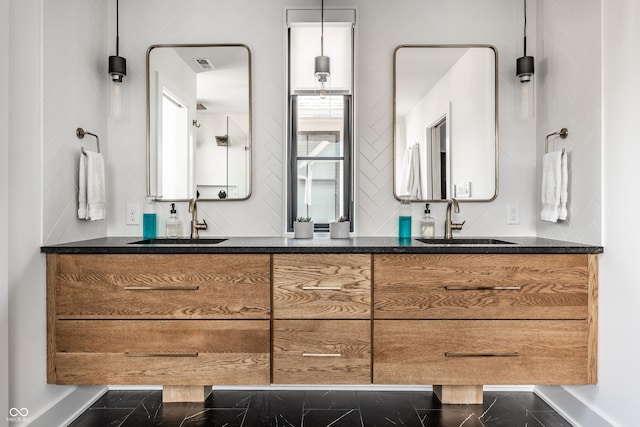 2036 Central Ave, Indianapolis, IN 46202 - bathroom with double vanity and baseboards