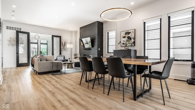 2036 Central Ave, Indianapolis, IN 46202 - dining room featuring light wood-style flooring, recessed lighting, and baseboards