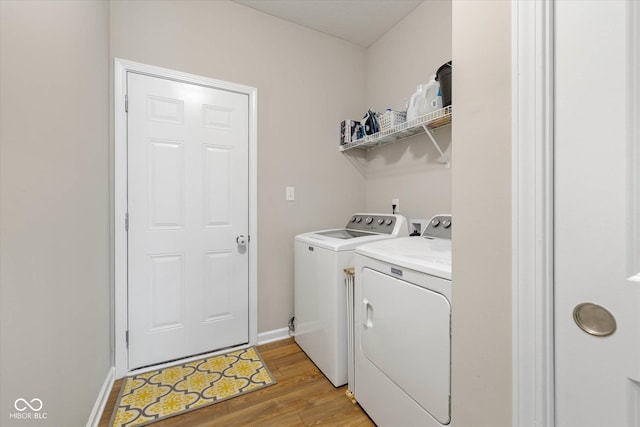 5375 Citadel Dr, Noblesville, IN 46062 - laundry area with independent washer and dryer, light wood-type flooring, and baseboards