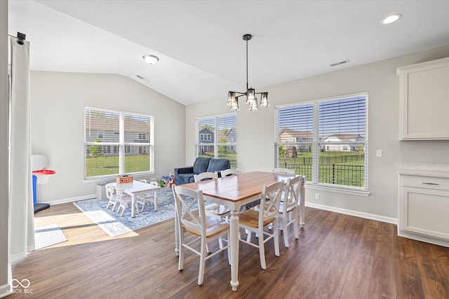 5375 Citadel Dr, Noblesville, IN 46062 - dining area featuring wood finished floors, a chandelier, lofted ceiling, baseboards, and recessed lighting