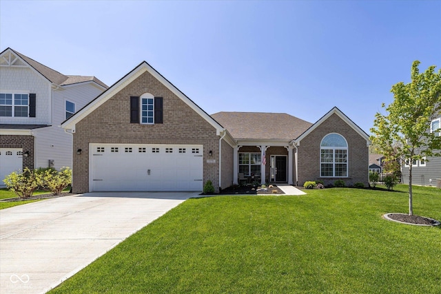 5375 Citadel Dr, Noblesville, IN 46062 - view of front facade featuring brick siding, a front lawn, and concrete driveway