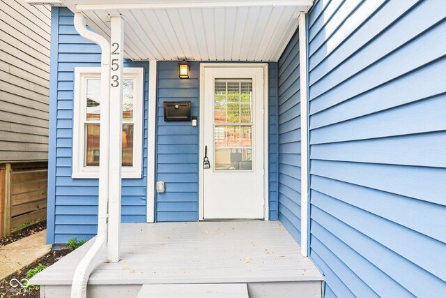 253 E Minnesota St, Indianapolis, IN 46225 - view of exterior entry with a deck