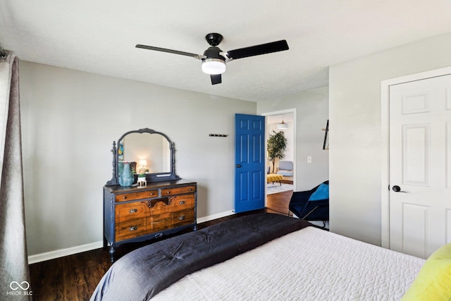 253 E Minnesota St, Indianapolis, IN 46225 - bedroom with baseboards, wood finished floors, and a ceiling fan