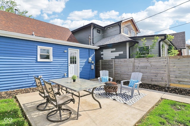 253 E Minnesota St, Indianapolis, IN 46225 - view of patio / terrace with fence, an outdoor fire pit, and outdoor dining space