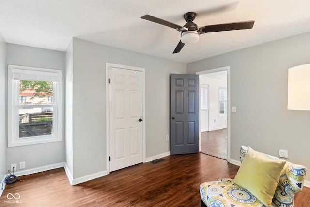 253 E Minnesota St, Indianapolis, IN 46225 - living area with wood finished floors, baseboards, and ceiling fan