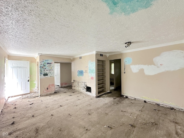 empty room with a textured ceiling and ornamental molding