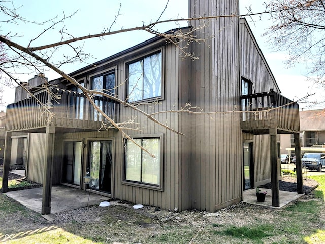 view of home's exterior with a patio