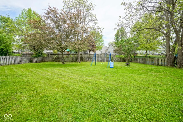 view of yard with a playground