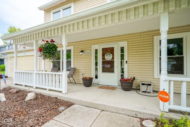 entrance to property with covered porch