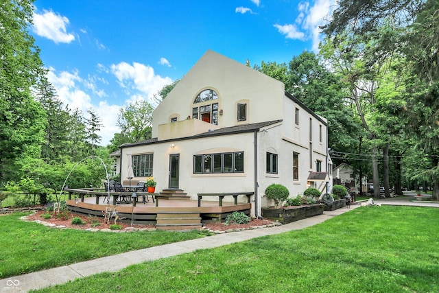 1530 E 75th St, Indianapolis, IN 46240 - view of front of house with stucco siding, a front yard, and a deck