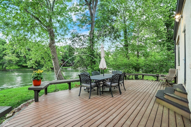 1530 E 75th St, Indianapolis, IN 46240 - wooden terrace featuring a water view, outdoor dining space, and view of wooded area