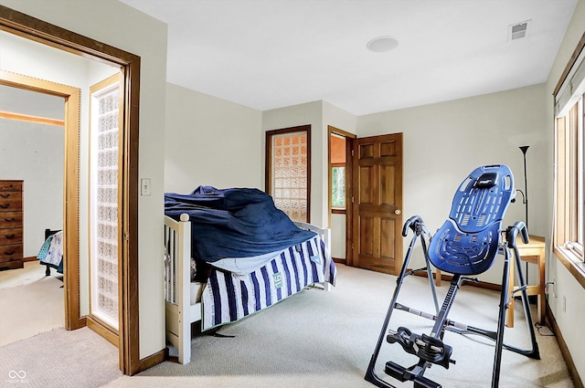 1530 E 75th St, Indianapolis, IN 46240 - bedroom featuring light colored carpet, baseboards, and multiple windows