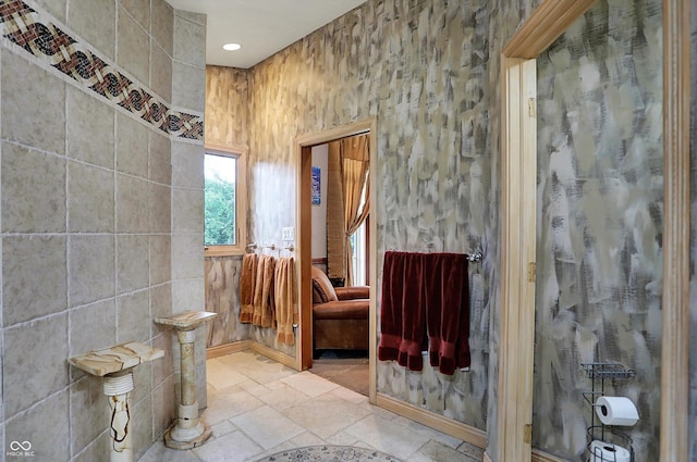 1530 E 75th St, Indianapolis, IN 46240 - ensuite bathroom with stone tile flooring