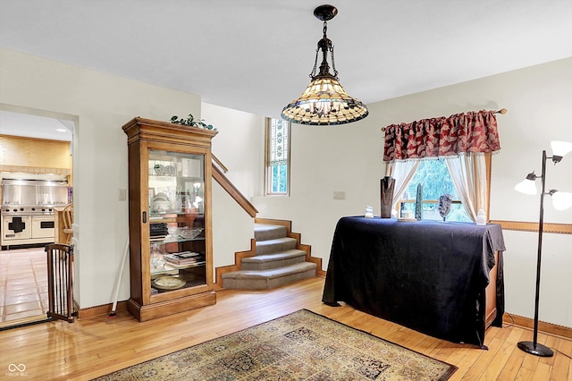 1530 E 75th St, Indianapolis, IN 46240 - interior space with light wood-style flooring, baseboards, and stairway