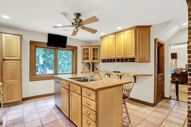 1530 E 75th St, Indianapolis, IN 46240 - kitchen featuring a sink, baseboards, stainless steel dishwasher, a breakfast bar area, and recessed lighting