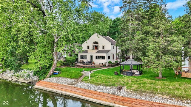 1530 E 75th St, Indianapolis, IN 46240 - rear view of property with a gazebo, stucco siding, a lawn, a deck with water view, and a patio area