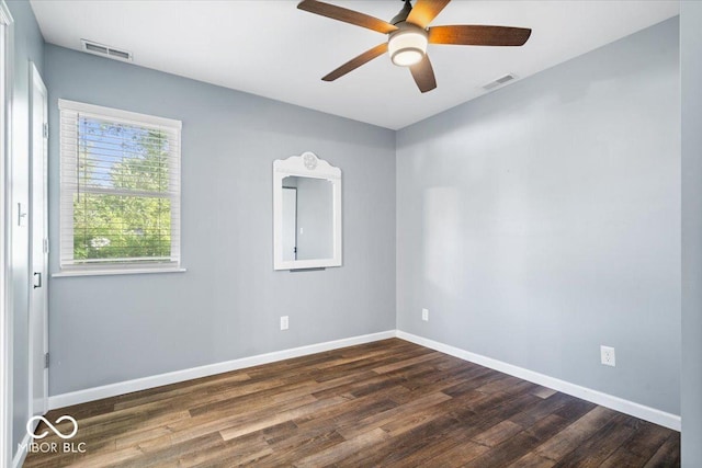 744 Gilbert Ave, Indianapolis, IN 46227 - empty room featuring dark wood-style floors, baseboards, and ceiling fan