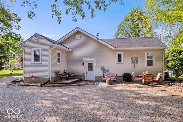 744 Gilbert Ave, Indianapolis, IN 46227 - back of house with a wooden deck and a patio area