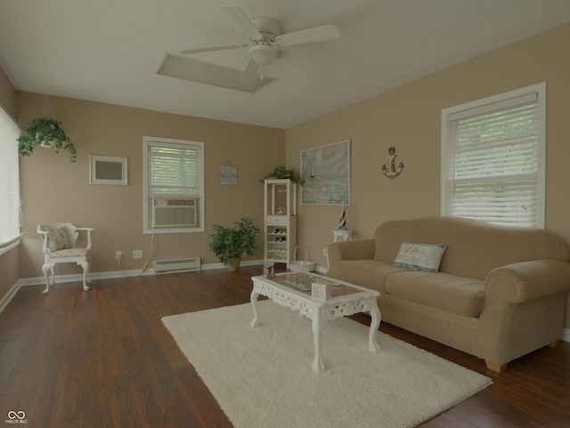 4363 E State Road 252, Franklin, IN 46131 - living area featuring a baseboard radiator, ceiling fan, wood finished floors, baseboards, and cooling unit