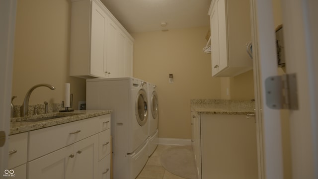 4363 E State Road 252, Franklin, IN 46131 - laundry area with cabinet space, light tile patterned floors, washer and dryer, and baseboards