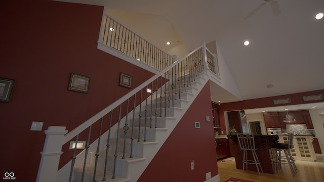 4363 E State Road 252, Franklin, IN 46131 - staircase featuring a towering ceiling, recessed lighting, wood finished floors, and a ceiling fan