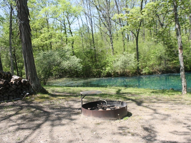 4363 E State Road 252, Franklin, IN 46131 - view of yard with an outdoor fire pit, a view of trees, and a water view