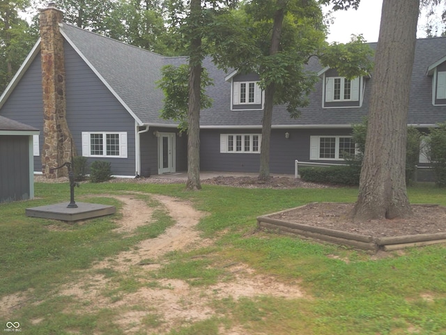 4363 E State Road 252, Franklin, IN 46131 - rear view of house with a shingled roof, a chimney, a lawn, and french doors
