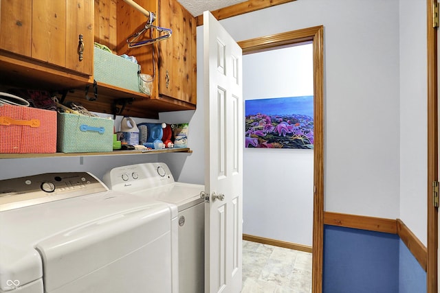 7655 N Kitchen Rd, Mooresville, IN 46158 - washroom with cabinet space, washing machine and dryer, baseboards, and light stone finish floors