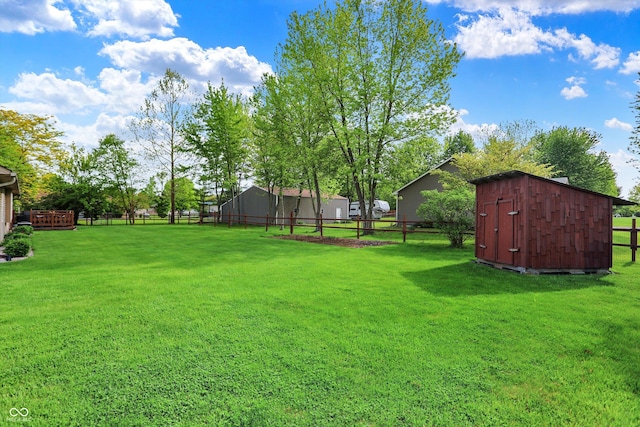 7655 N Kitchen Rd, Mooresville, IN 46158 - view of yard featuring a storage shed and an outbuilding