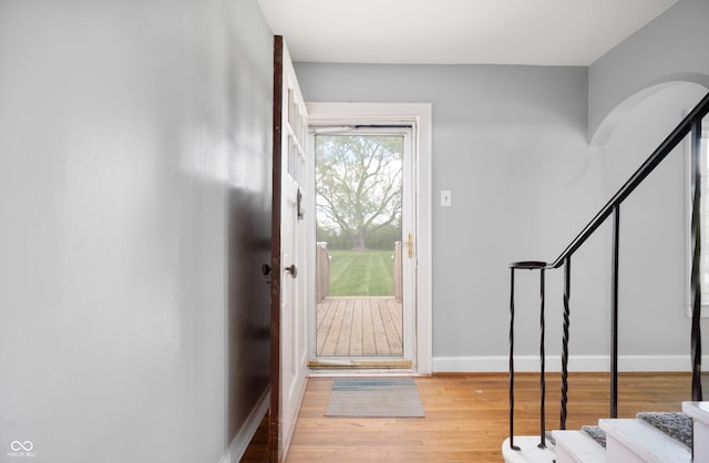 6851 W County Road 550 S, Daleville, IN 47334 - entryway featuring stairway, wood finished floors, and baseboards