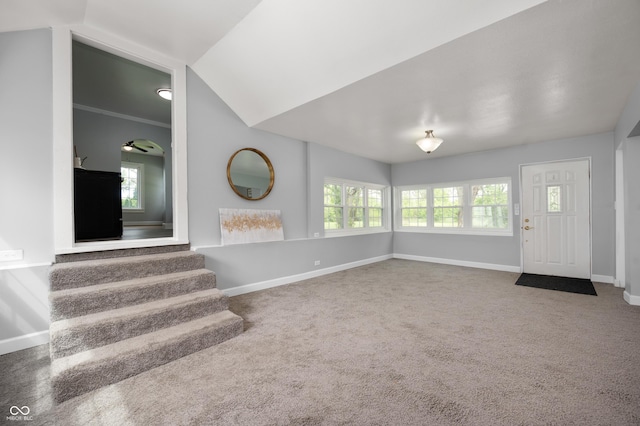 6851 W County Road 550 S, Daleville, IN 47334 - carpeted entrance foyer with plenty of natural light, baseboards, vaulted ceiling, and stairs