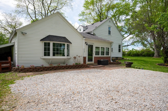6851 W County Road 550 S, Daleville, IN 47334 - back of property featuring cooling unit, a lawn, roof with shingles, and a patio