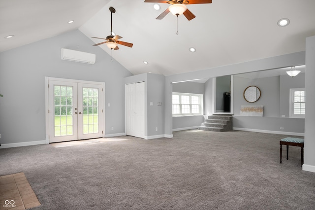 6851 W County Road 550 S, Daleville, IN 47334 - unfurnished living room featuring a wall mounted air conditioner, a ceiling fan, high vaulted ceiling, stairway, and carpet floors