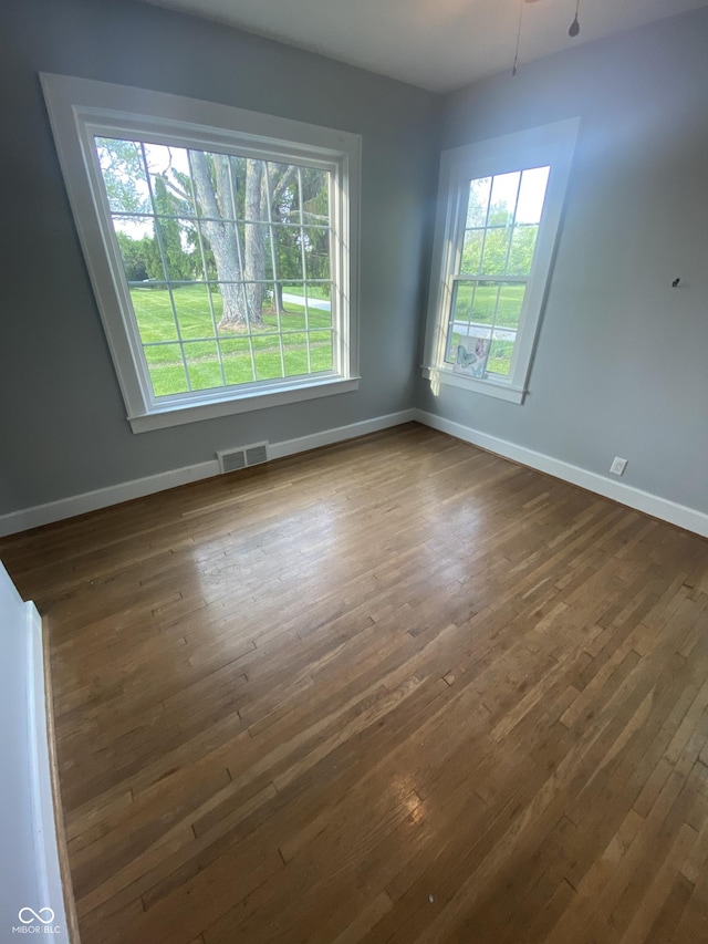 6851 W County Road 550 S, Daleville, IN 47334 - unfurnished dining area featuring baseboards and dark wood-type flooring