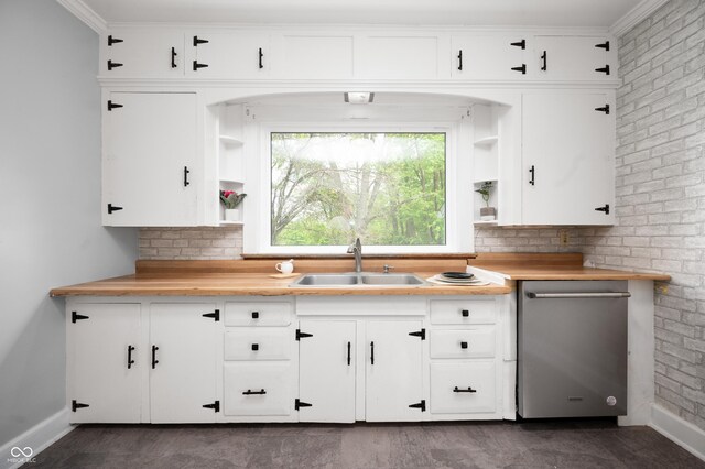 6851 W County Road 550 S, Daleville, IN 47334 - kitchen with open shelves, a sink, dishwasher, and baseboards