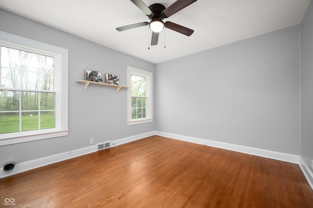 6851 W County Road 550 S, Daleville, IN 47334 - unfurnished room featuring baseboards, wood finished floors, and ceiling fan